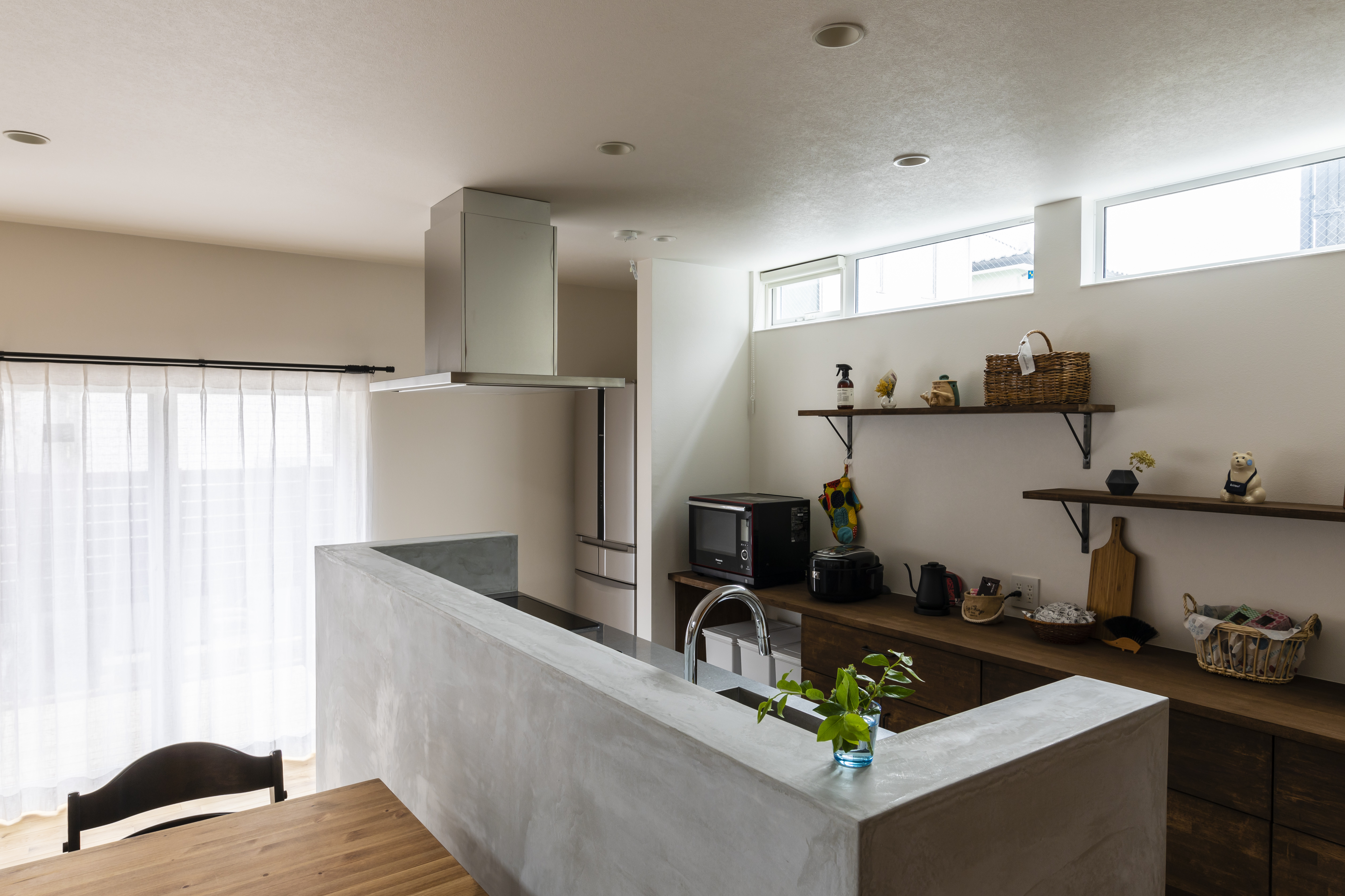 吹き抜けで家族が繋がる家